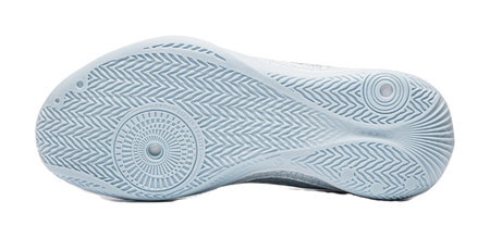 Ice blue low basketball shoe outsole with circular traction pattern