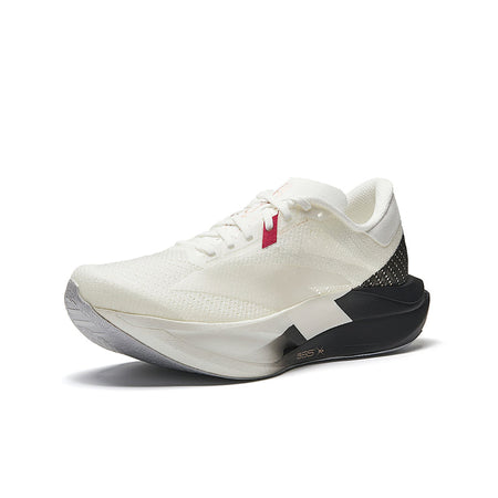 White running shoe with black side panel, red logo detail, and cushioned midsole