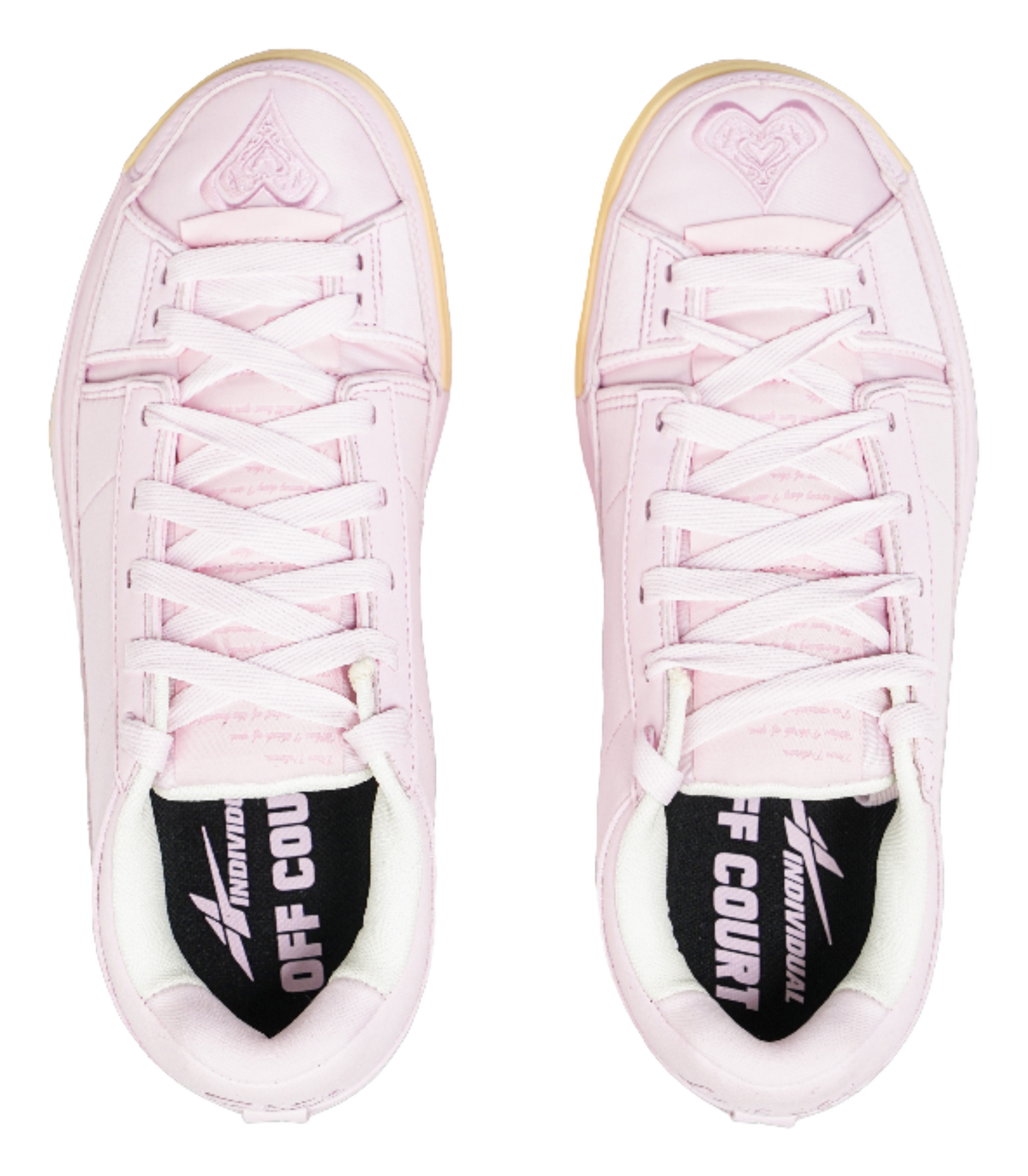Pink low-top sneakers with white laces and black sockliner graphic at heel