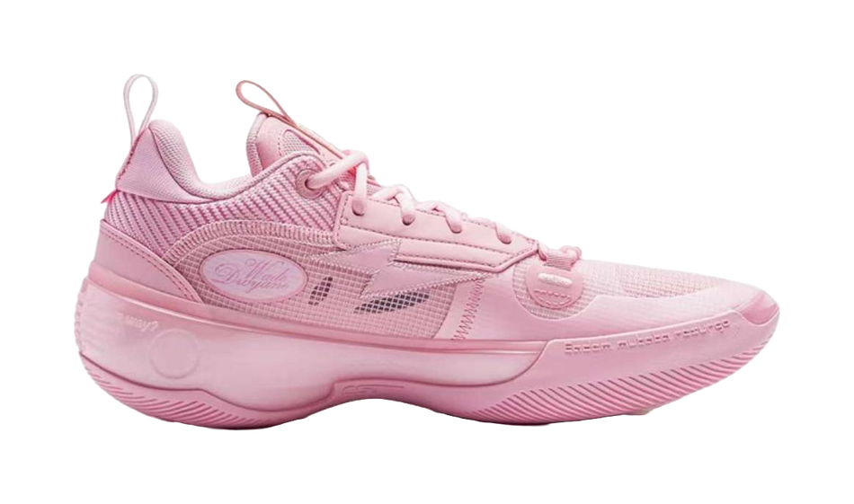 Pink low-top basketball shoe side view, textured upper and sculpted midsole