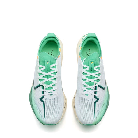 Pair of men's running shoes, white uppers with green lining and lace-up front