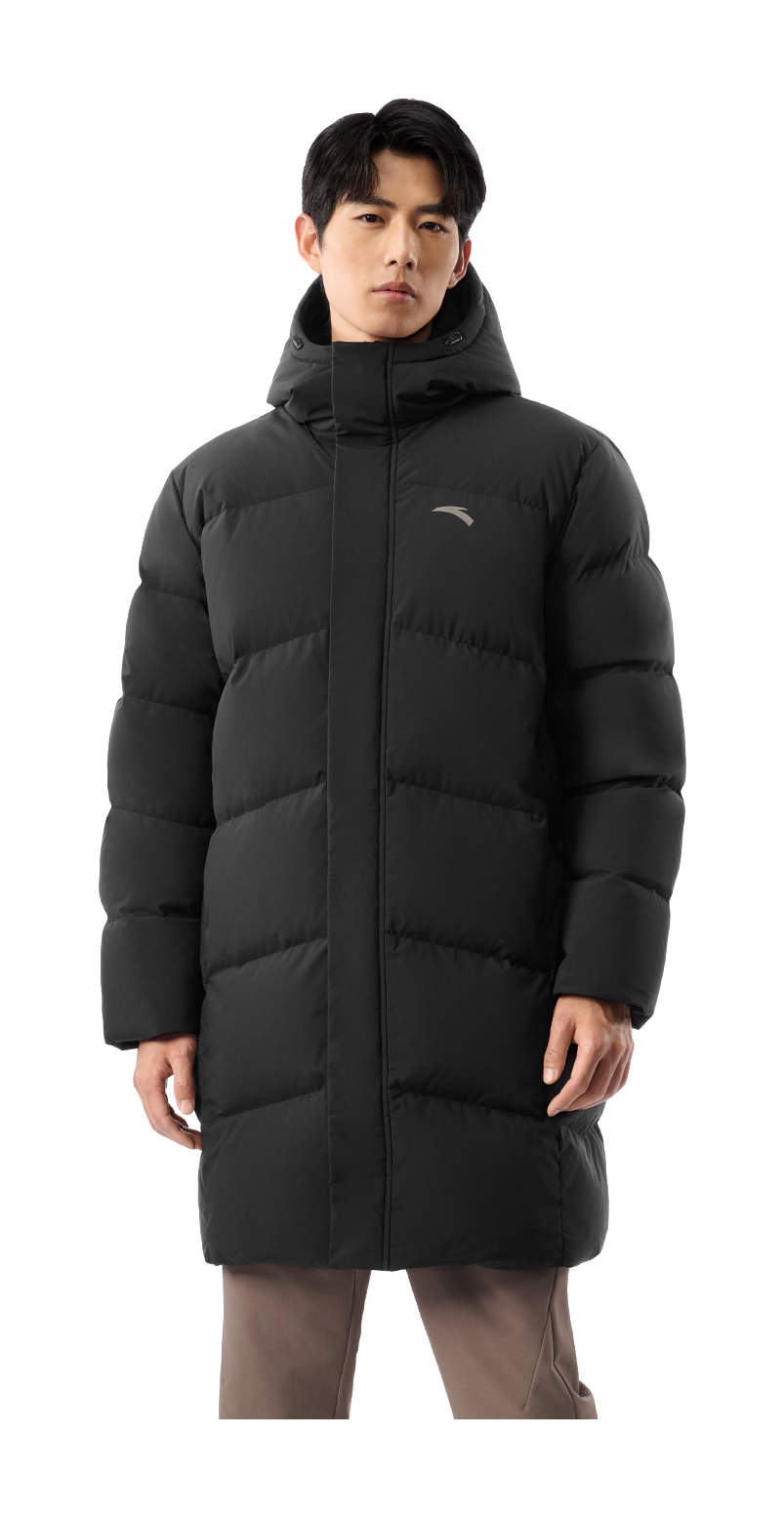 Men's black long puffer down jacket with hood, front view worn