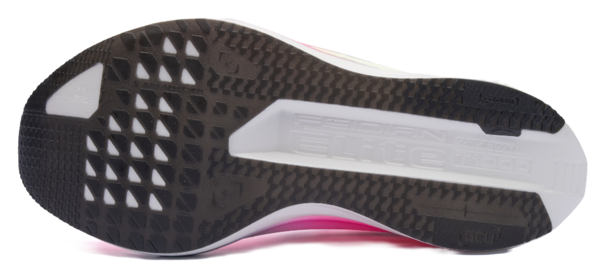 Shoe outsole with black traction pattern, white midfoot, and pink rim trim