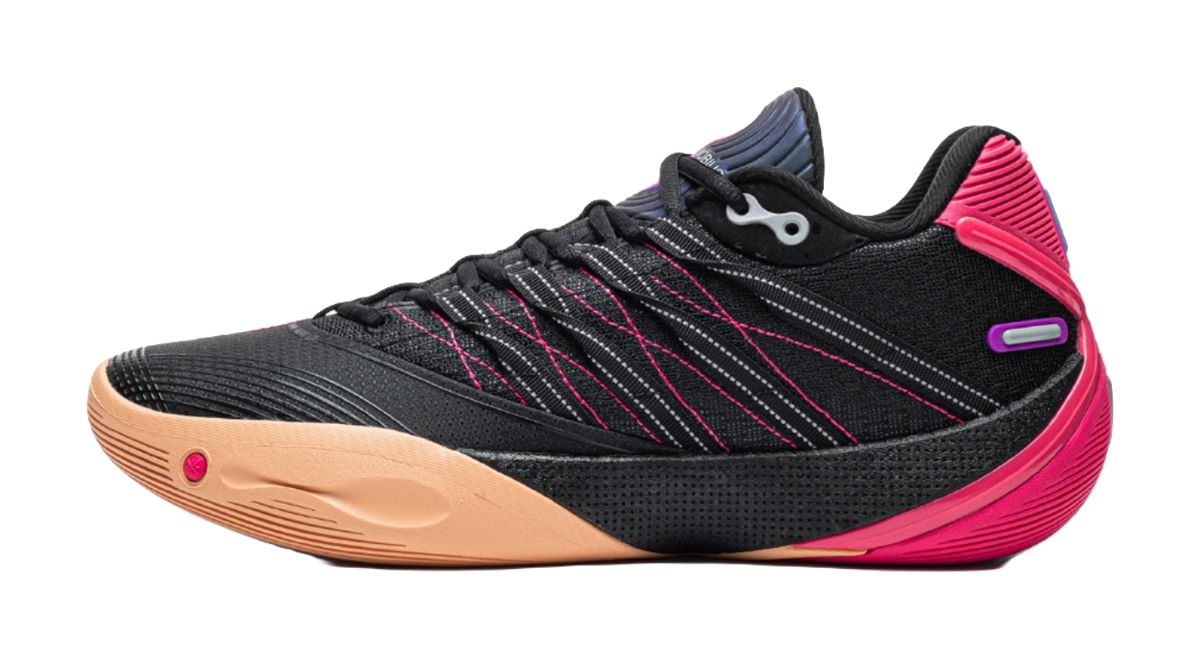Low basketball shoe with black mesh upper, pink side accents, and gum outsole.