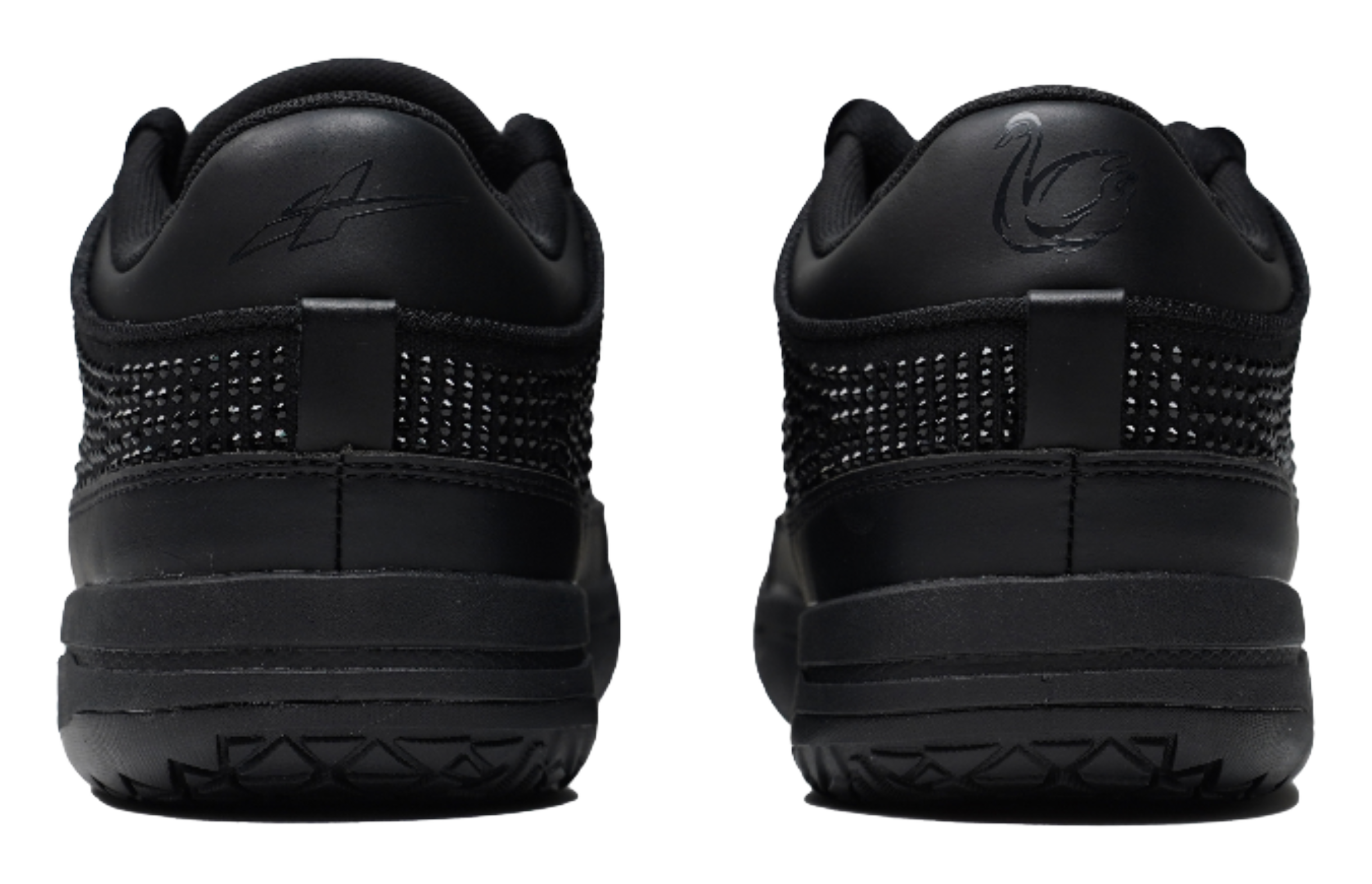 Black basketball shoes heel with textured side panels and cushioned midsole.