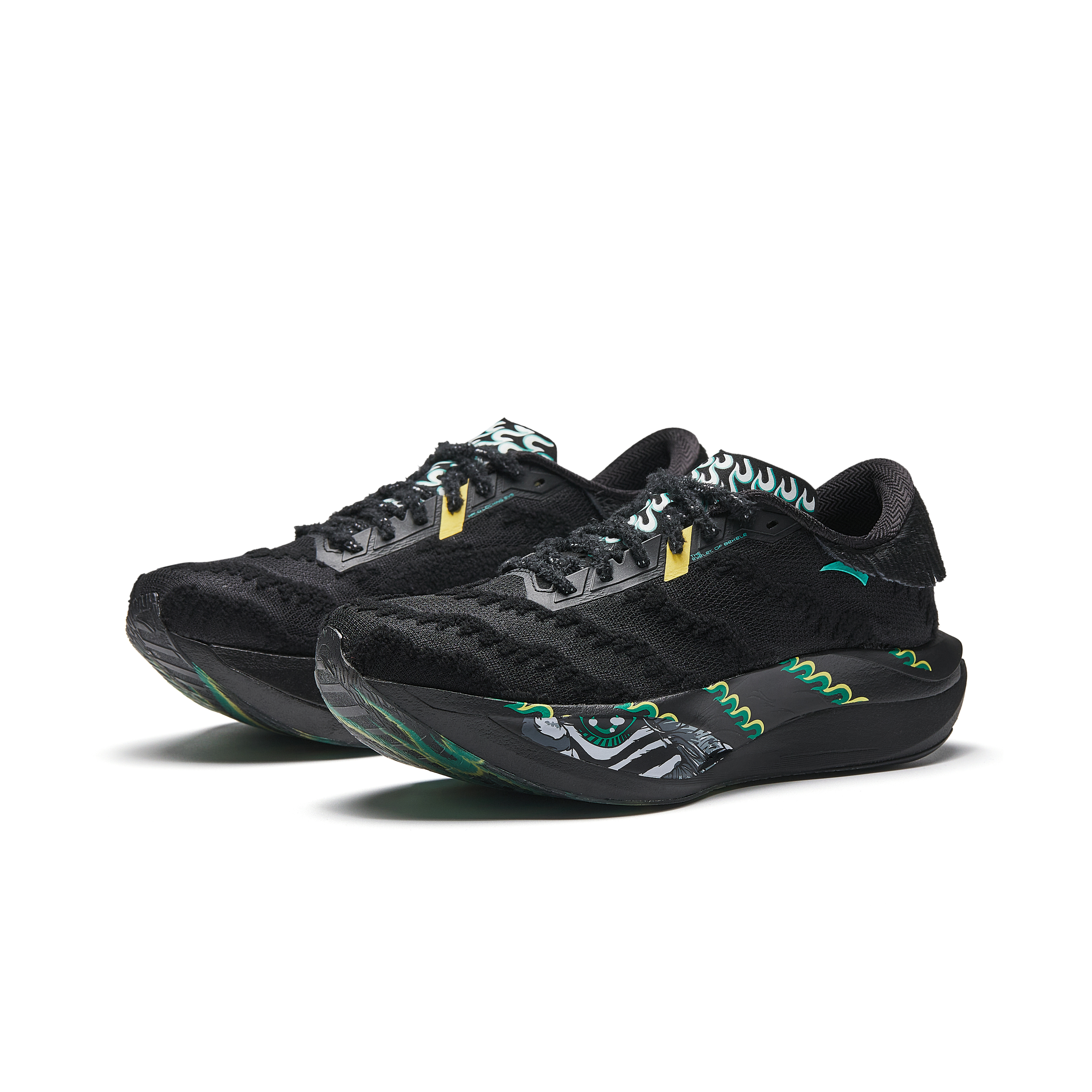 Women’s black running shoes with green accents, lace-up, textured mesh upper, graphic sole.