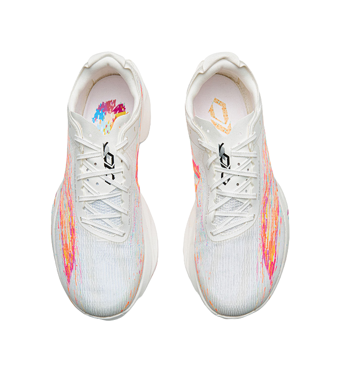 White sneakers with multicolor heel graphics and lace-up front, padded collar.