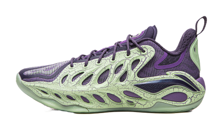 Purple and green basketball shoe with lace-up front, textured upper panels
