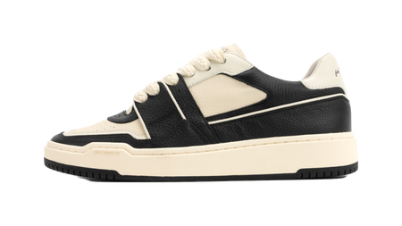 Black and white unisex skate trainer shoes with lace-up front and low profile sole