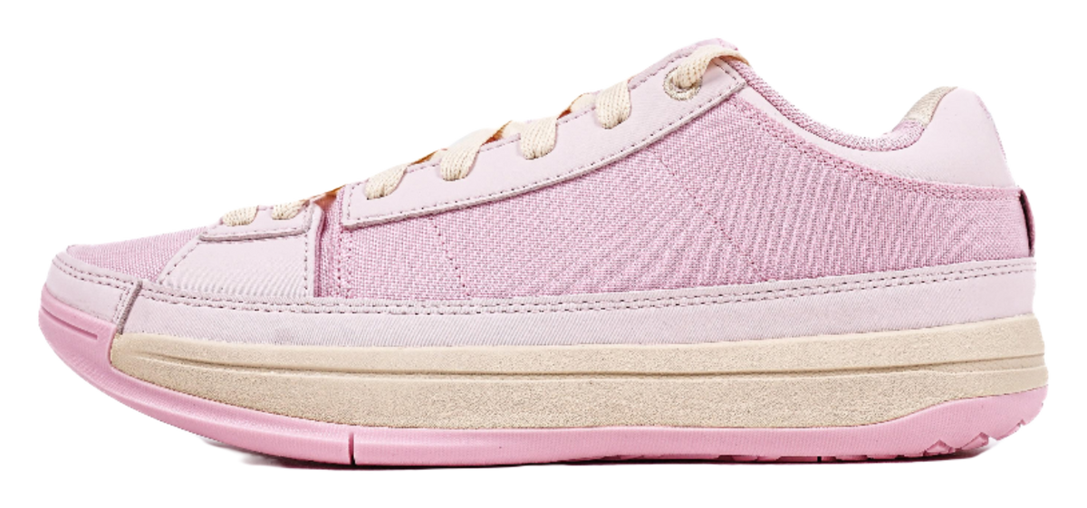 Pink lace-up basketball sneakers with canvas upper and beige midsole