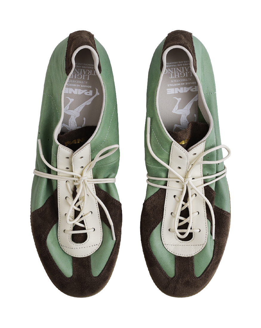 Mint and brown lace-up shoes with white laces and padded collar