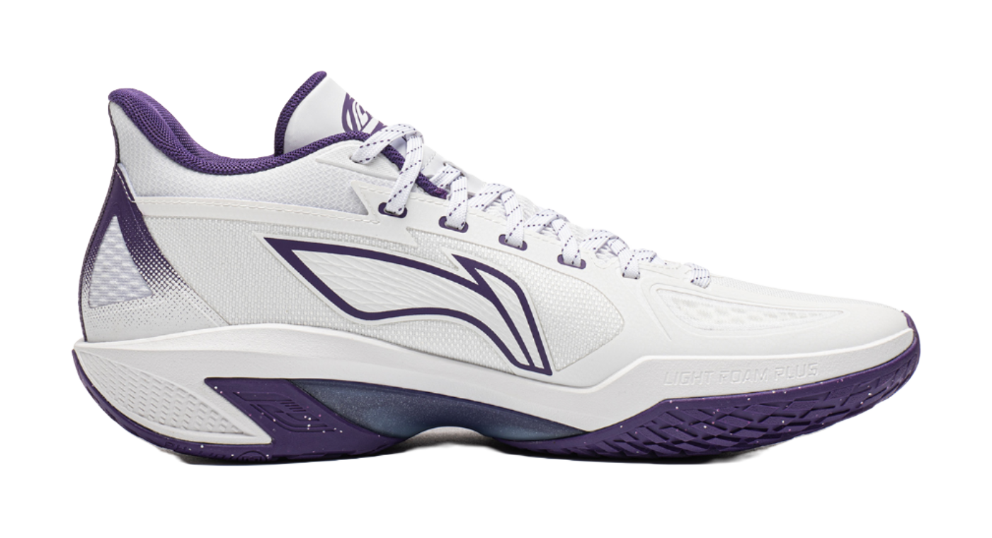 Low-top basketball shoe, white upper with purple heel and side logo, lace-up.