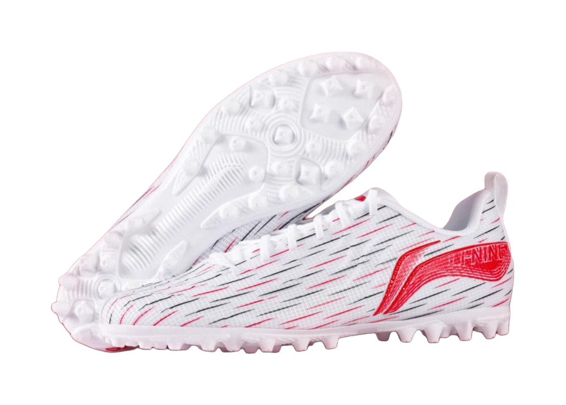 Youth soccer shoe outsole view: white cleats with red flame stripe on upper
