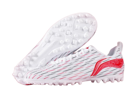 Youth soccer shoe outsole view: white cleats with red flame stripe on upper