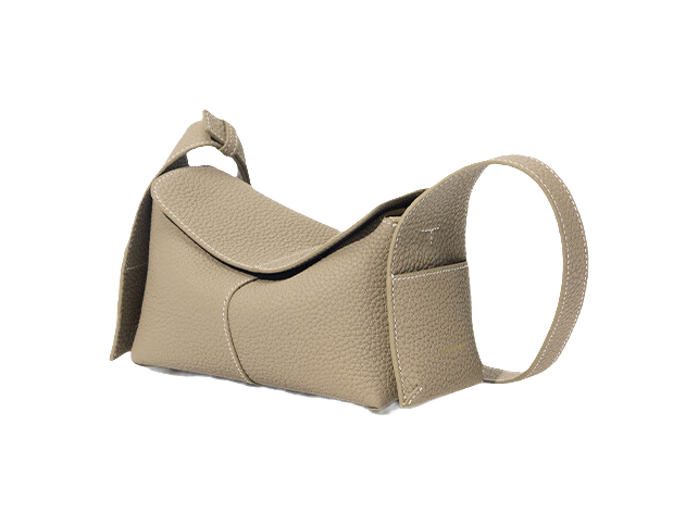 Mini cow leather shoulder bag in beige with top flap and side pocket detail