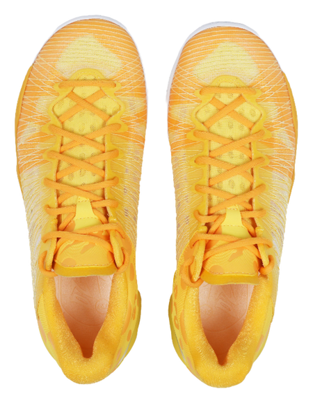 Pair of low-top basketball shoes, yellow uppers with orange lace detail
