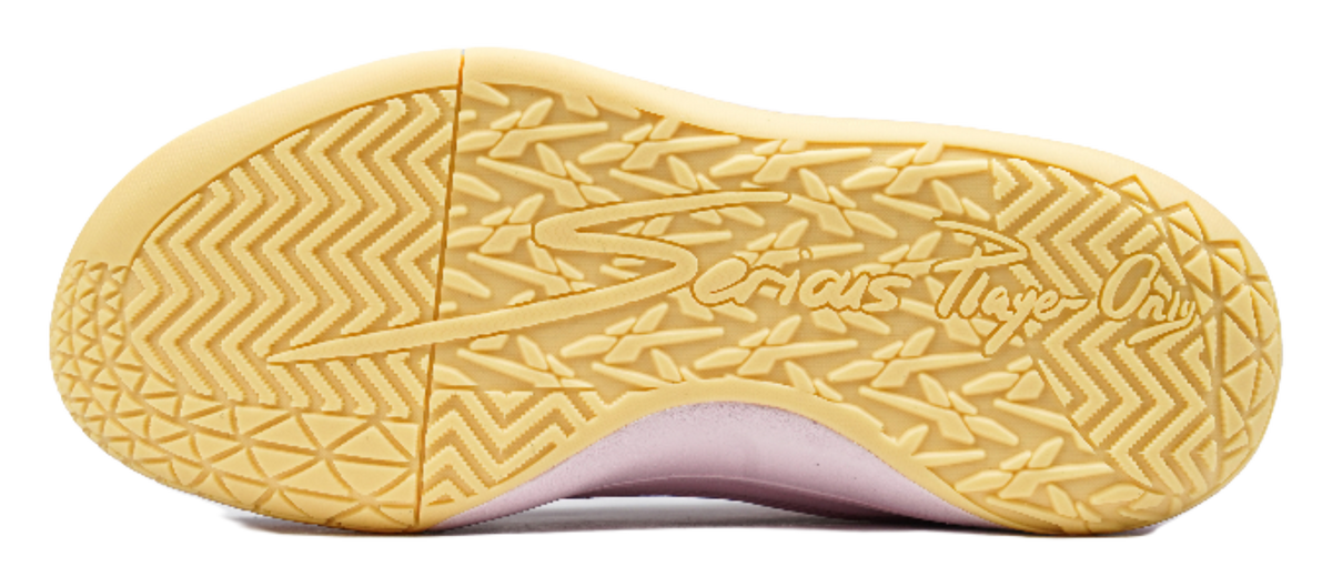 Gold rubber outsole with zigzag traction pattern and star emblem