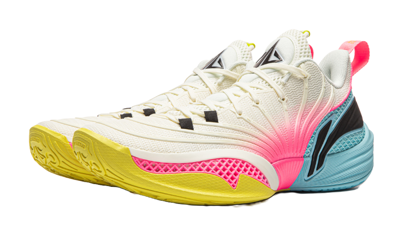 White and pink basketball sneaker with black heel panel and yellow outsole, lace-up.