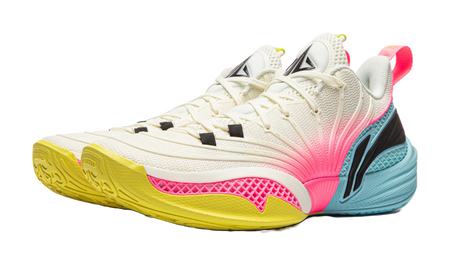 White and pink basketball sneaker with black heel panel and yellow outsole, lace-up.