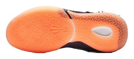 Purple basketball shoe outsole view, orange rubber traction tread with circular vent