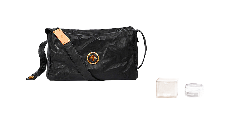 GROTTO black pleated sheepskin crossbody bag with tan label and included accessories