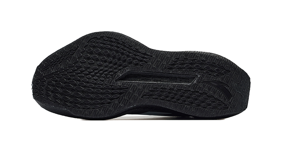Women's running shoes, black textured outsole with patterned traction tread