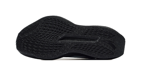 Women's running shoes, black textured outsole with patterned traction tread