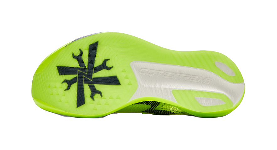 Neon yellow outsole of low-top running shoes with tread pattern and COTEXTREM logo