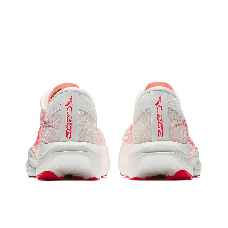 Women's running shoe heel, white back with red accents, cushioned sole, lace-up.