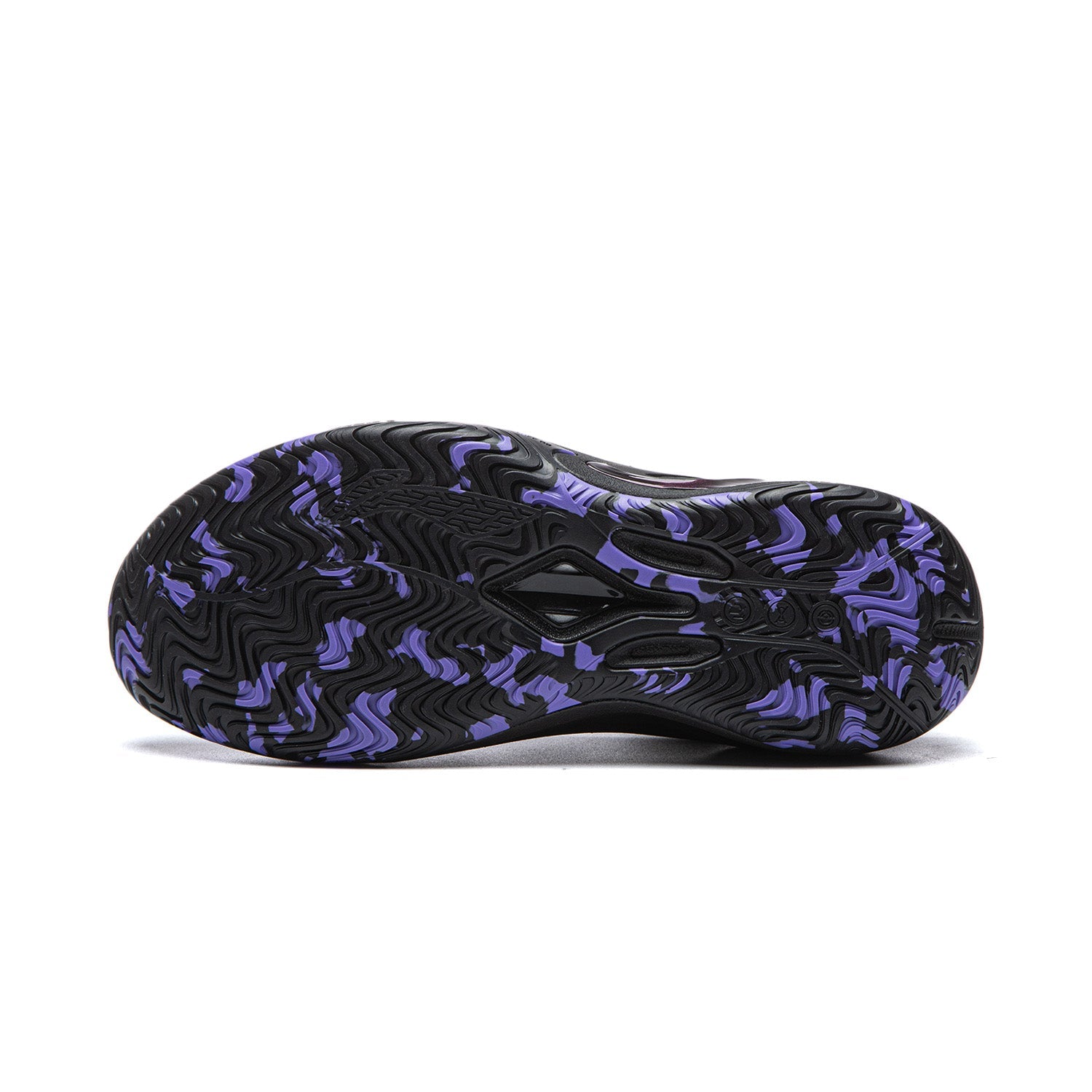Black basketball shoe outsole with purple and blue patterned traction tread.
