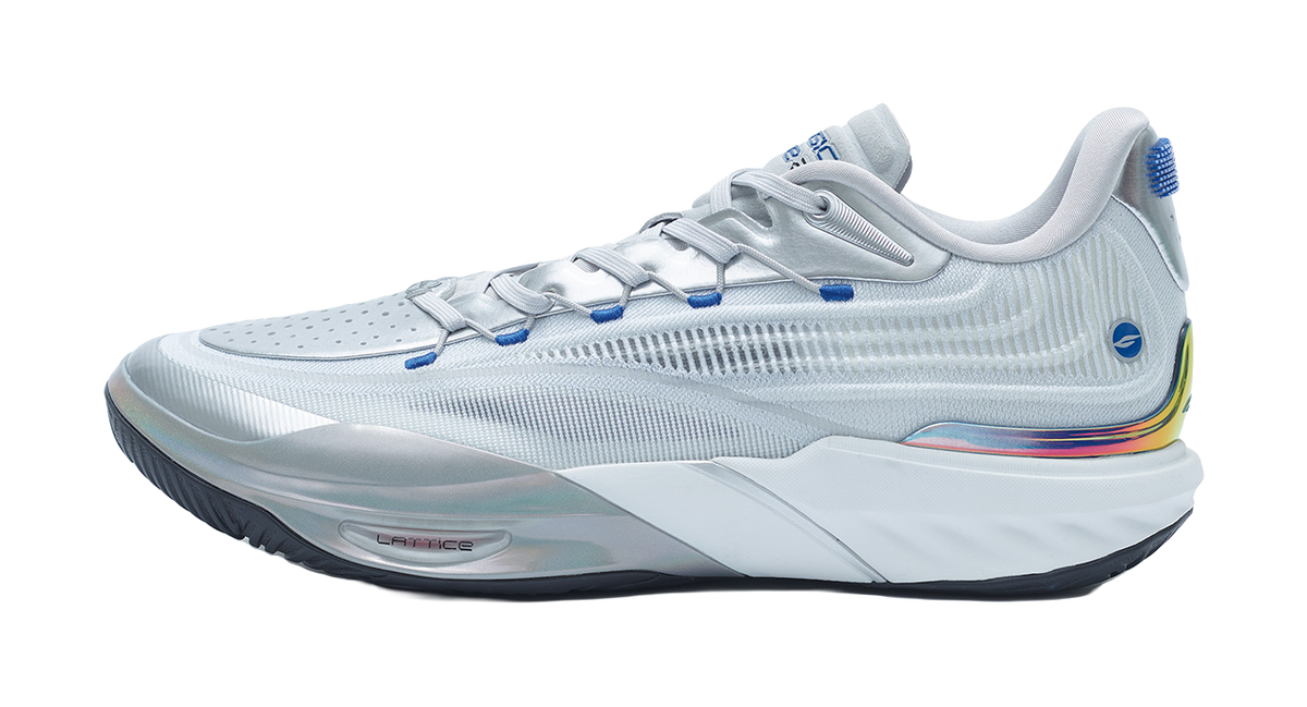 Silver basketball shoe with blue laces, knit upper, and low-cut padded collar