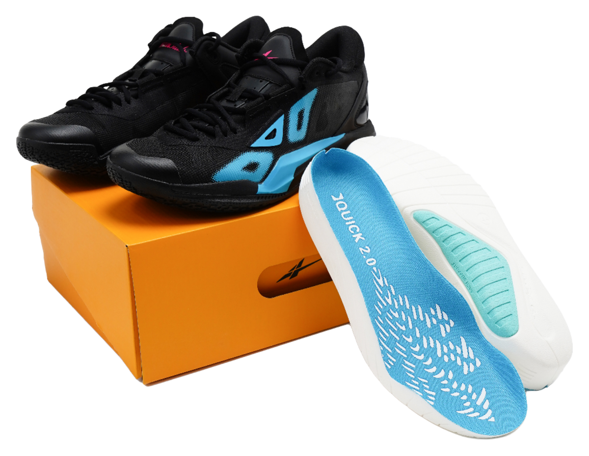 Black low-top basketball shoes with blue-and-white sole, lace-up.