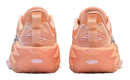 Light pink and orange basketball shoe heels with COURT branding on the collar
