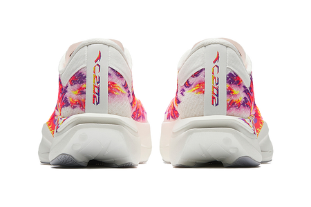 Rear view of white running shoes with multicolor print and molded heel collar