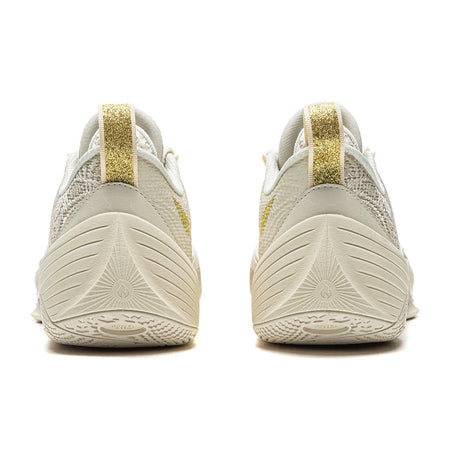 Men's basketball shoe in paper white, rear view with gold heel pull tab and padded collar