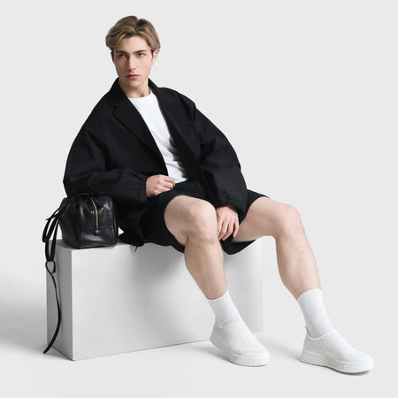 White 3D-printed casual sneakers with textured mesh upper and thick sole