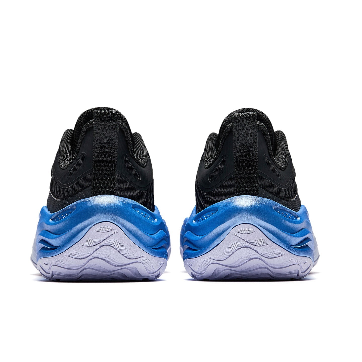 Black basketball shoes with blue heel accents and textured outsole midsole