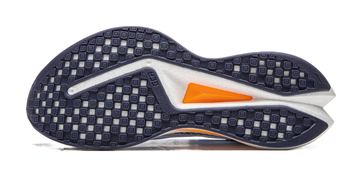 Dark navy outsole of a running shoe with orange forefoot insert