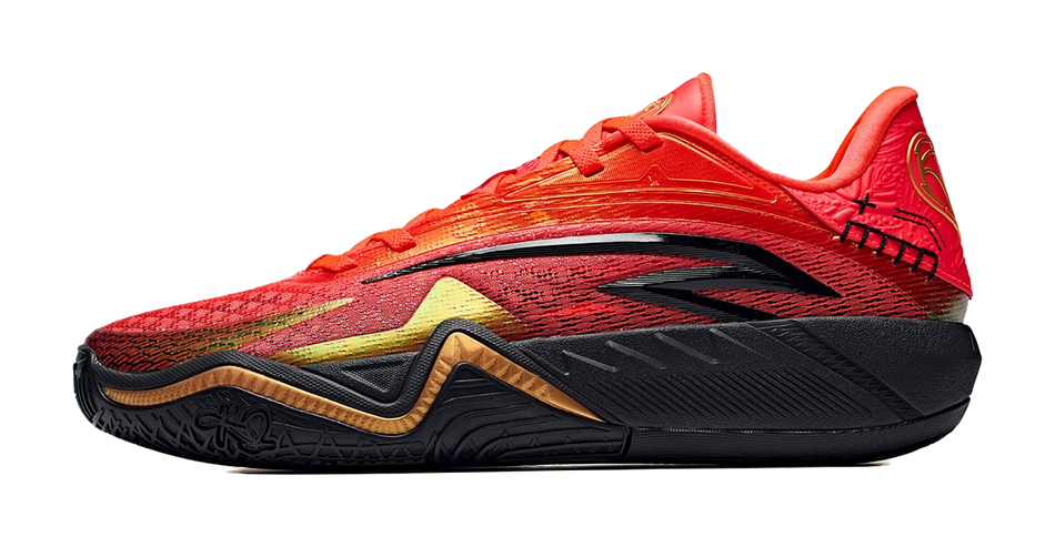 Red and black low basketball shoe with textured knit upper and lace-up closure.