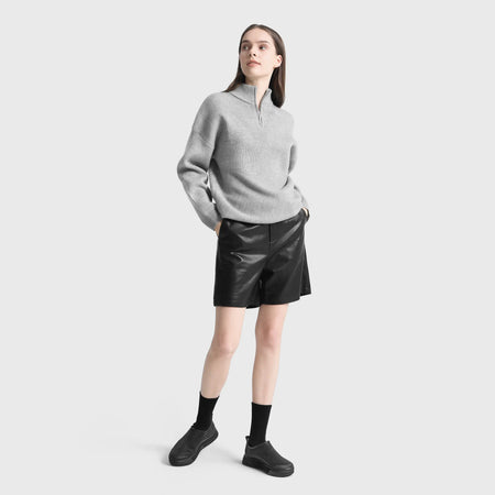 Black 3D-printed casual sneakers with crew socks and slip-on mesh upper