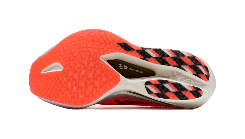 Women’s marathon racing shoe outsole, orange tread pattern with XTEP markings.