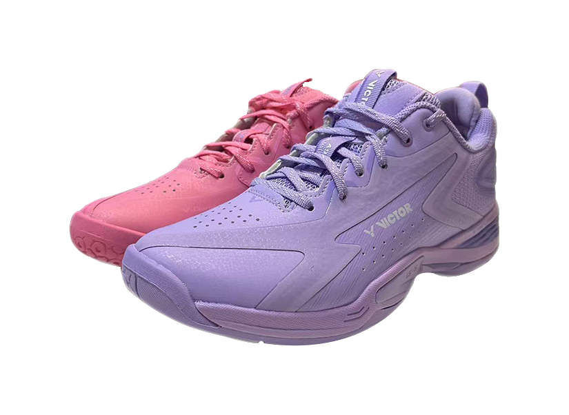Badminton shoe pair in pink and purple, lace-up with molded sole