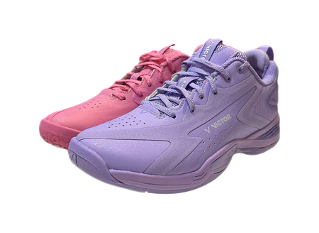 Badminton shoe pair in pink and purple, lace-up with molded sole