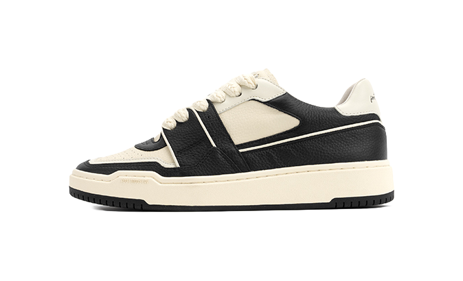 Black and white unisex lace-up skate sneakers with contrast side stripe and cupsole