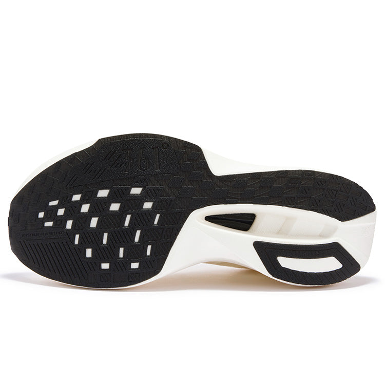 Running shoe outsole, black traction tread with white midsole and heel grip