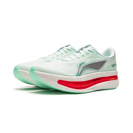 Women's running shoe, ice blue upper with teal swoosh, red midsole, white outsole