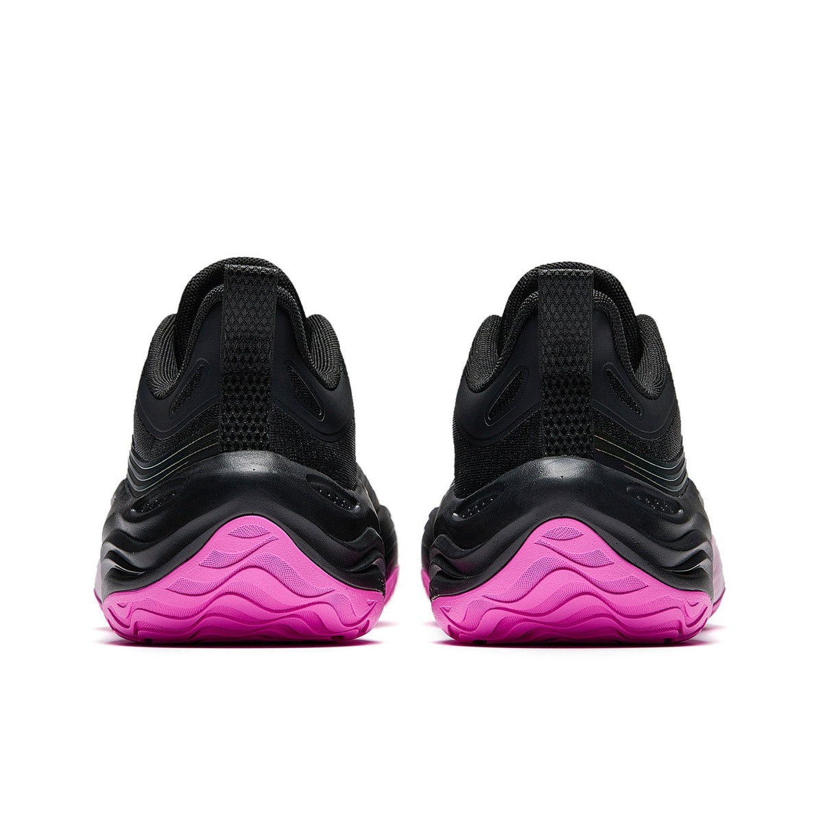 Pair of basketball shoes heel view with black uppers and purple-pink midsoles