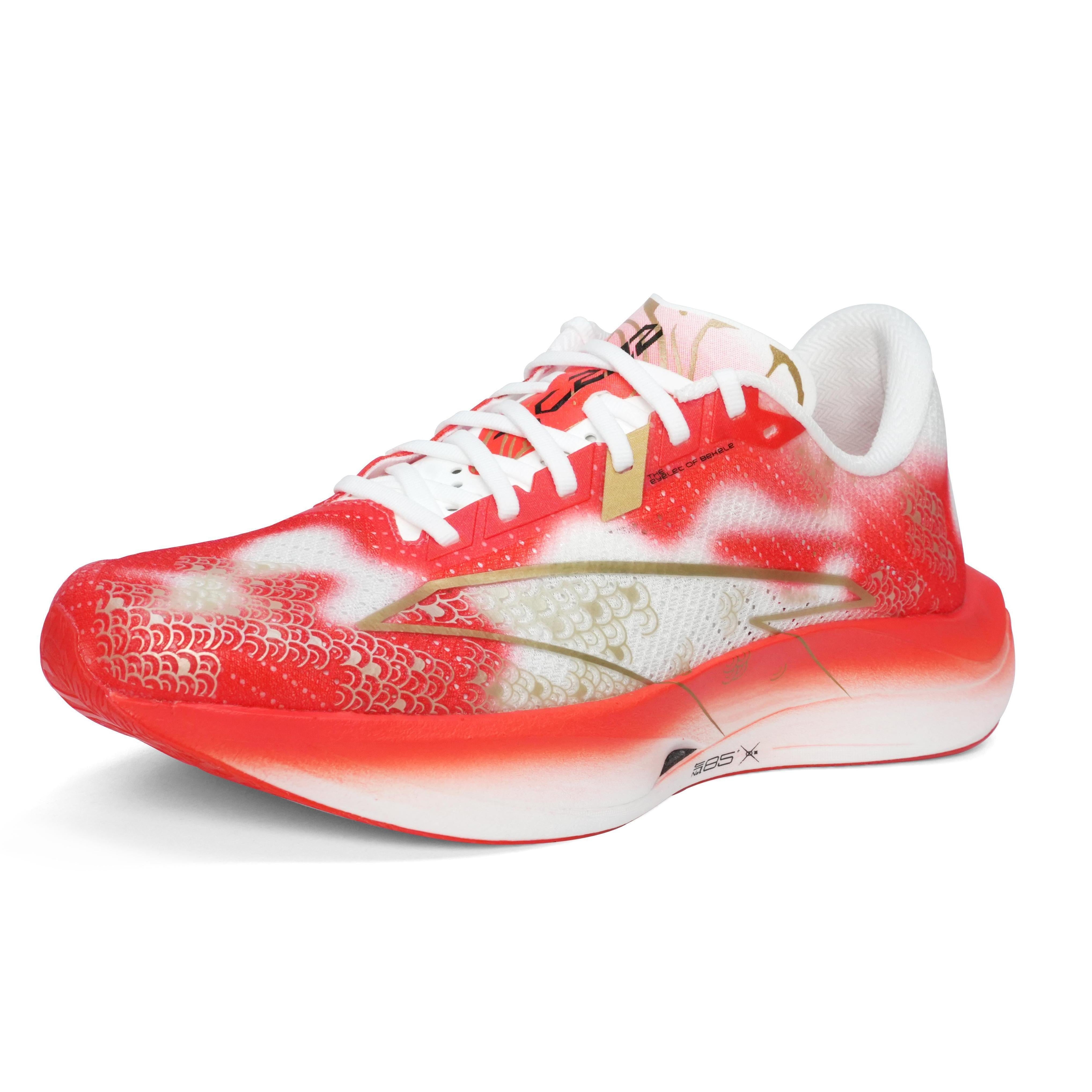 Women’s running shoes with red/orange uppers, koi scale print, white laces, gold details