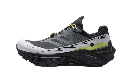White and black trail running shoe with green accent panel, lace-up closure, side view.