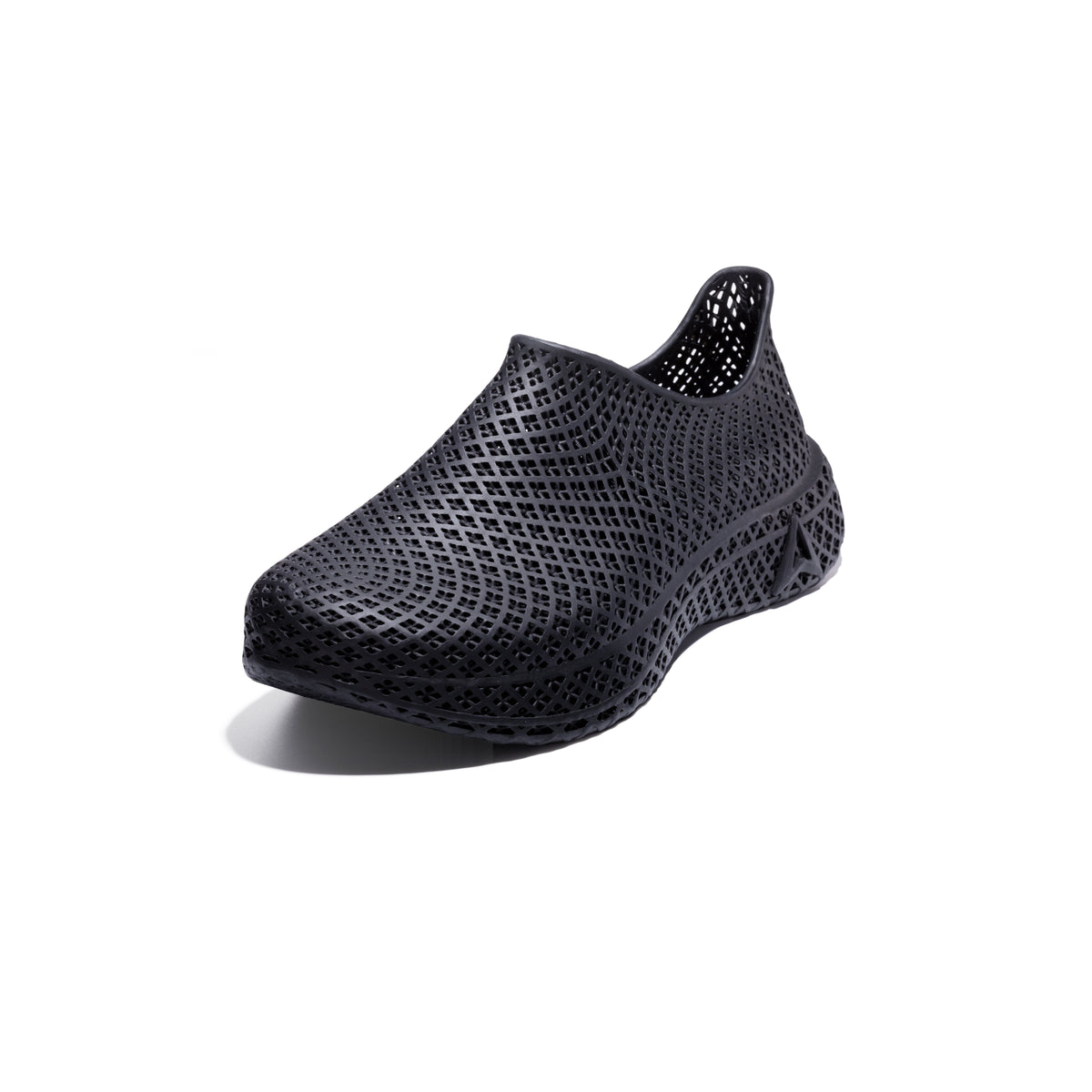 3D printed slip-on sneaker, dark textured upper, side view